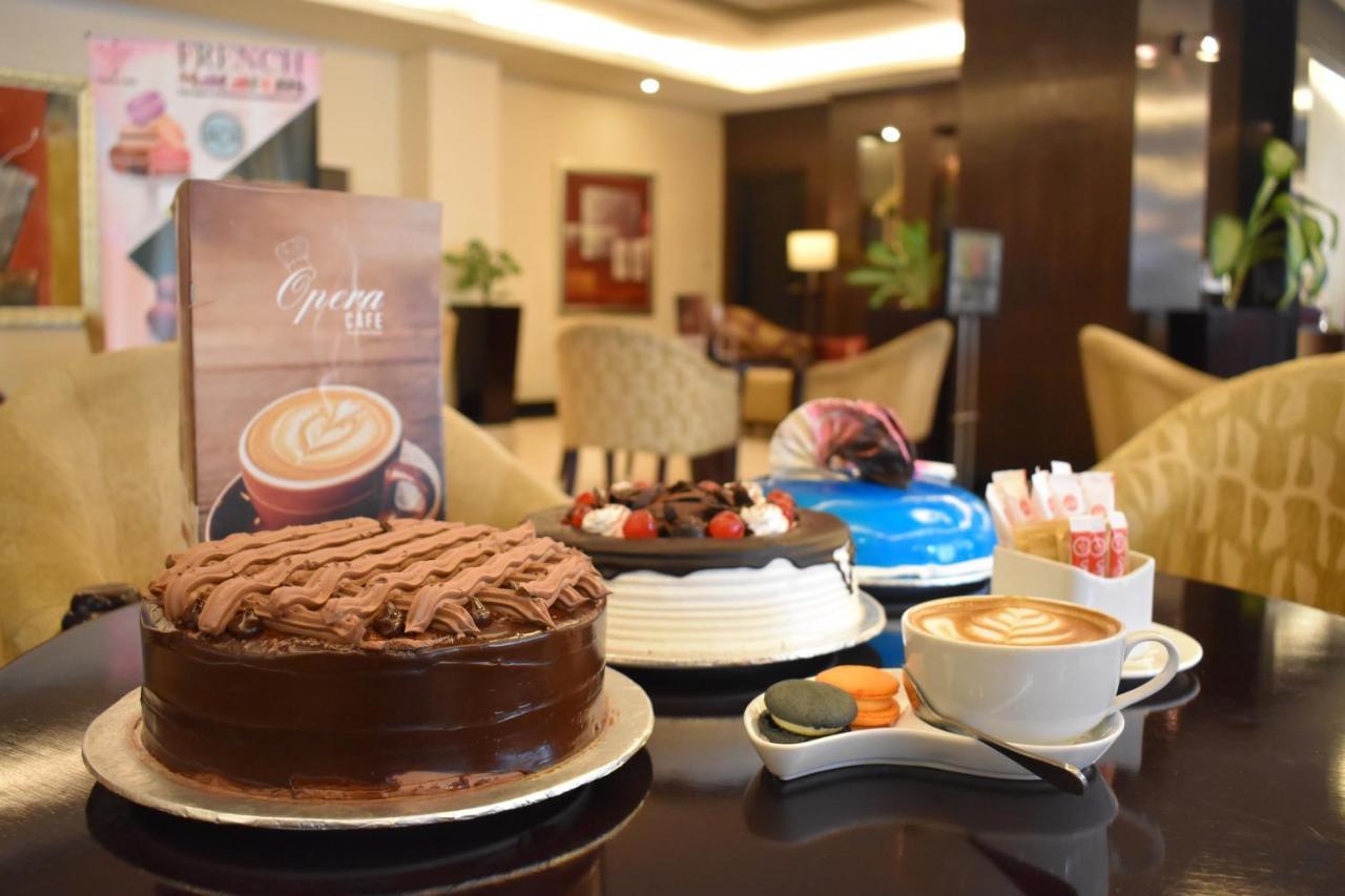 라마다 플라자 바이 윈덤 카라치 에어포트 호텔 외부 사진 Coffee Shop
